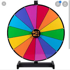 Multicolor spinning prize wheel with 'Spin It to Win It' text, representing a digital name picker or random choice generator.